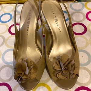 Taupe colored suede heels; 3.5” with front bow detail.  EUC